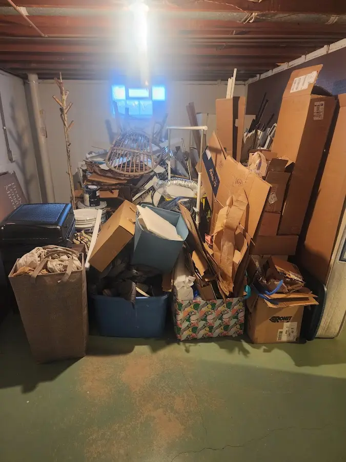 Roll-off dumpster container at job site for 4 Yard Dumpster Rental in Vergennes